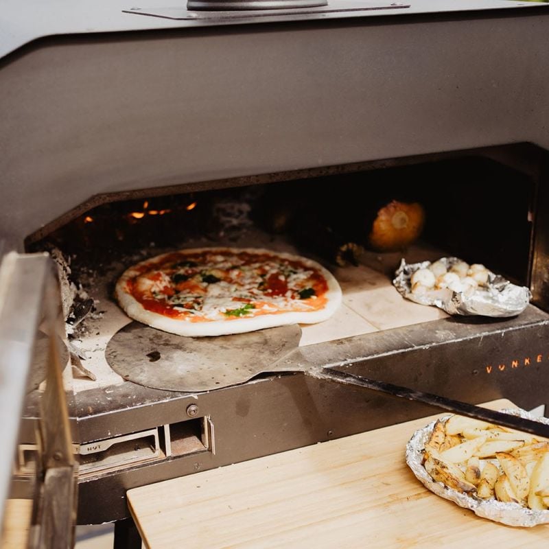 Pizza oven kopen voor buiten? Hout of gas